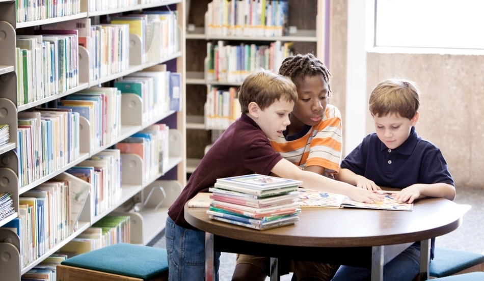 Children reading in library